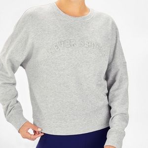 Fabletics “Never Settle” Stacey Pullover